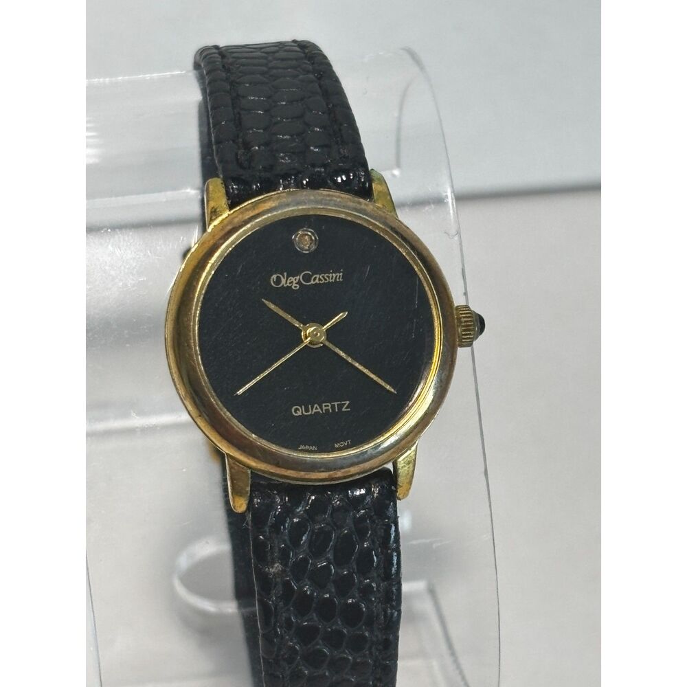 Oleg Cassini vintage quartz round 24mm women's watch, working